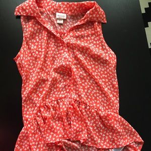 Bright orange sheet sleeveless blouse